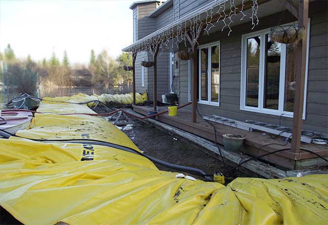 house protected from flooding with the water-gate barriers from megasecureurope